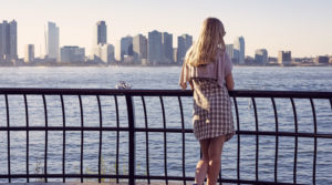 girl looking at new york city